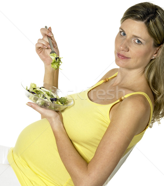 pregnat woman eating salad Stock photo © phbcz