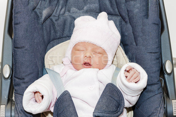 portrait of newborn baby girl in a car seat Stock photo © phbcz