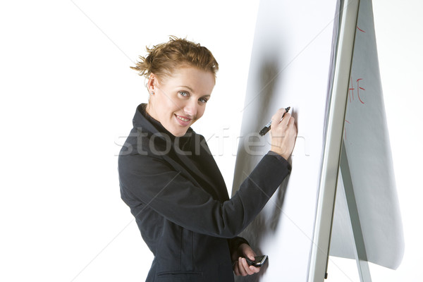 Stock photo: businesswoman at whiteboard