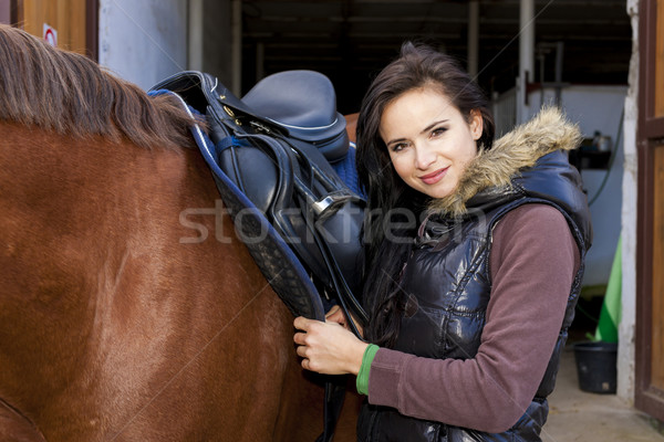 Stock photo: portrait of equestrian with her horse