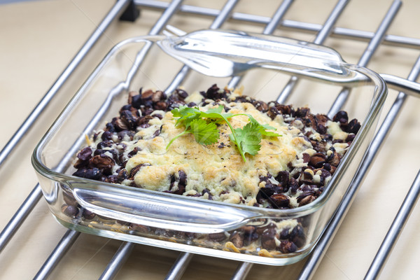baked black beans with cheese Emmentaler Stock photo © phbcz