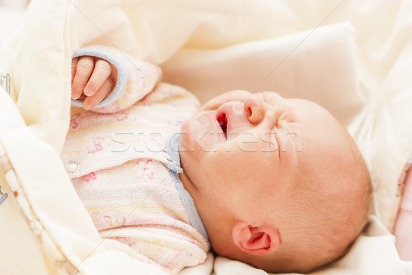 Stock photo: portrait of crying newborn baby girl