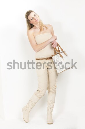 standing woman wearing fashionable brown boots Stock photo © phbcz