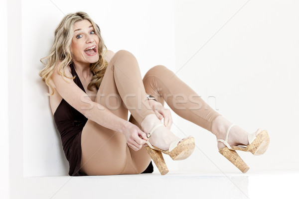 Stock photo: sitting woman wearing summer clothes and shoes