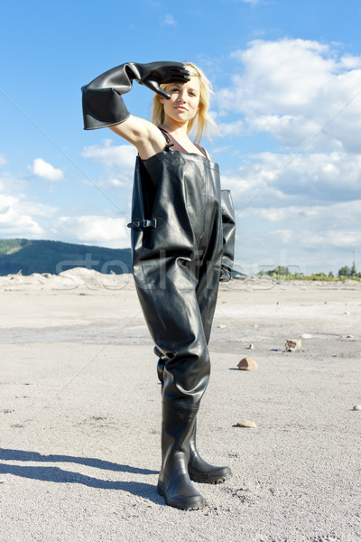 standing woman wearing protective clothes Stock photo © phbcz