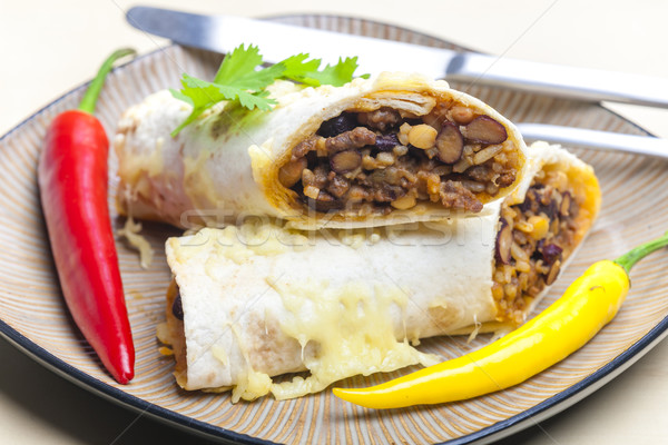 burrito filled with beef minced meat and beans baked with gouda  Stock photo © phbcz