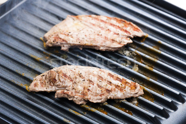 Befsztyk elektryczne grill mięsa grill BBQ Zdjęcia stock © phbcz