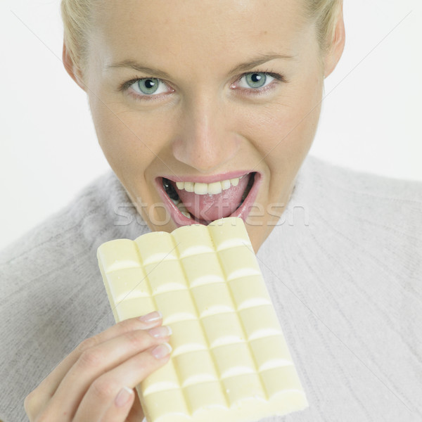 woman with white chocolate Stock photo © phbcz