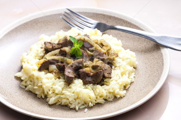 Wieprzowina nerka ryżu tablicy widelec zioła Zdjęcia stock © phbcz