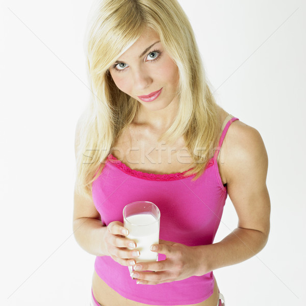 Femeie sticlă lapte ochelari bea tineri Imagine de stoc © phbcz