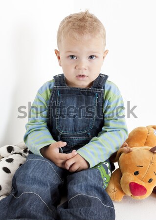 sitting toddler with a toy Stock photo © phbcz