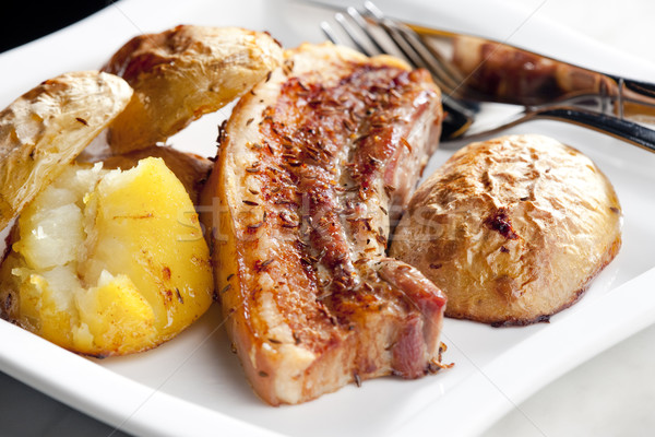 roasted pork meat with potatoes Stock photo © phbcz