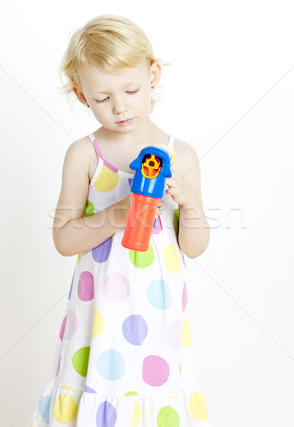 little girl with bubbles maker Stock photo © phbcz