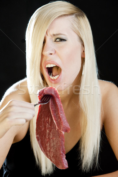 portrait of woman with raw meat Stock photo © phbcz