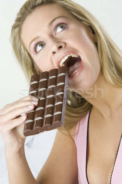 portrait of woman with chocolate Stock photo © phbcz