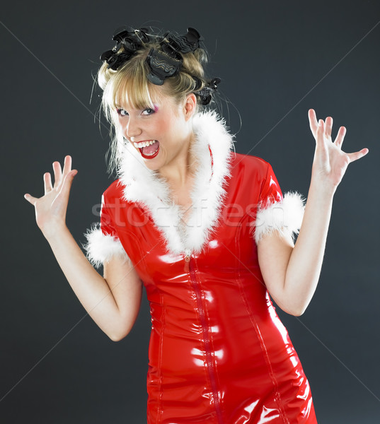 Santa Claus with rollers Stock photo © phbcz