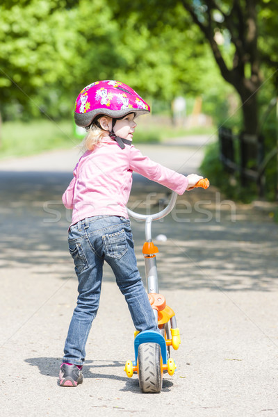 Kislány moped lány gyermek pihen póló Stock fotó © phbcz