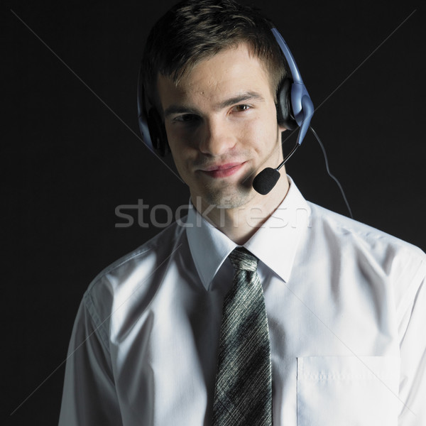 Stockfoto: Man · telefoon · hoofdtelefoon · telefoon · werk