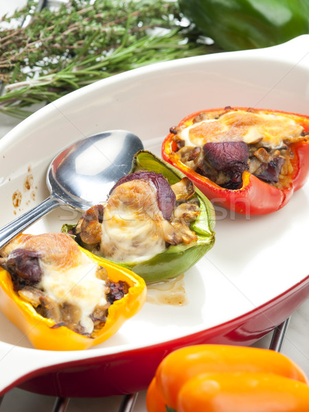 peppers filled with champignons and chicken livres baked with mo Stock photo © phbcz