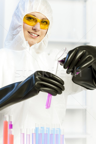 young woman wearing protective coat in laboratory Stock photo © phbcz