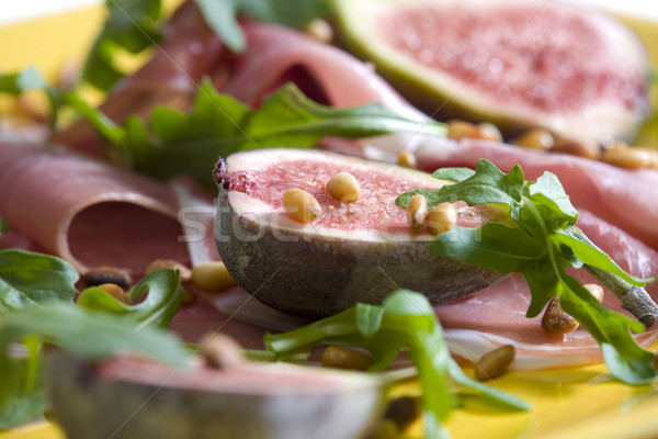 Spanish ham with figs and pine nuts Stock photo © phbcz