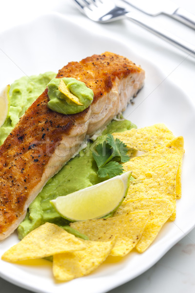 grilled salmon fillet with avocado sauce and nachos Stock photo © phbcz