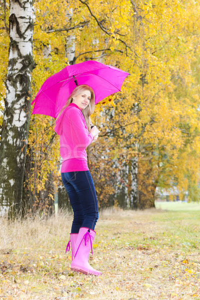 woman wearing rubber boots with umbrella in autumnal nature Stock photo © phbcz