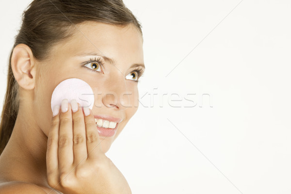 Stock photo: portrait of young woman with cotton pad
