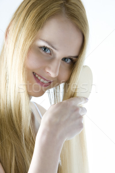 Stock photo: portrait of combing woman wearing underwear