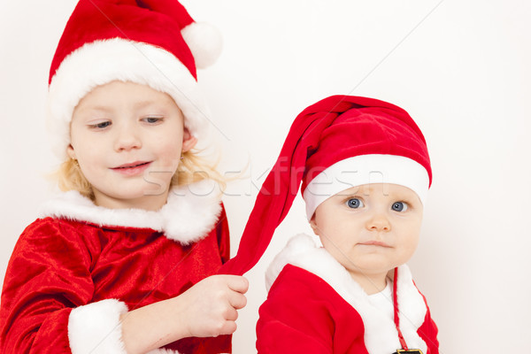 two little girls as Santa Clauses Stock photo © phbcz