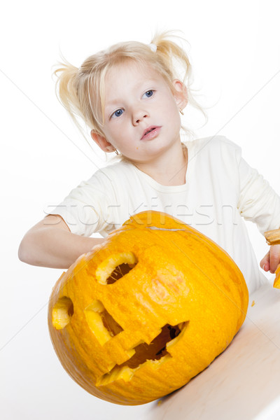 little girl carving pumpkin for Halloween Stock photo © phbcz