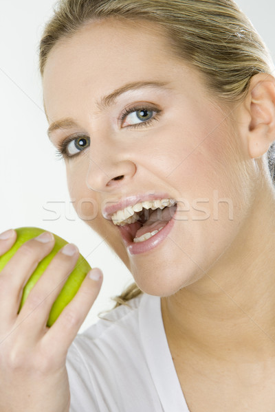 portrait of woman with green apple Stock photo © phbcz