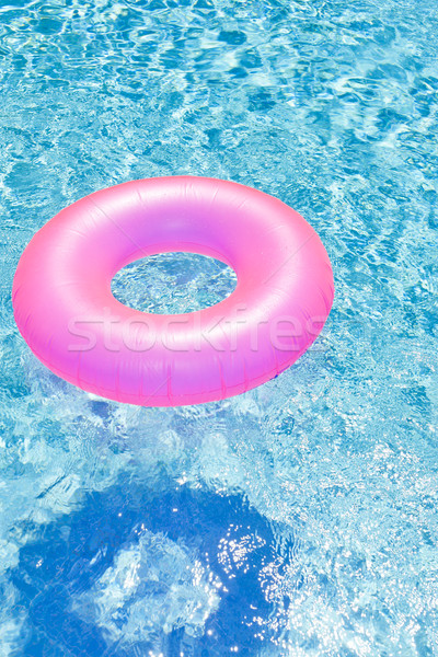 pink rubber ring in swimming pool Stock photo © phbcz
