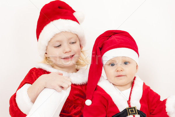 two little girls as Santa Clauses Stock photo © phbcz