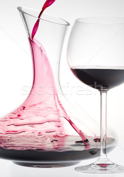 wine glass and carafe with red wine Stock photo © phbcz