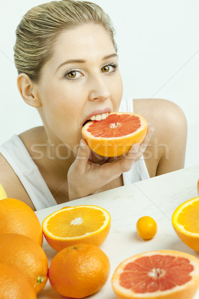 Retrato comer pomelo alimentos mujeres Foto stock © phbcz