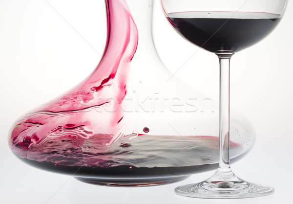 wine glass and carafe with red wine Stock photo © phbcz