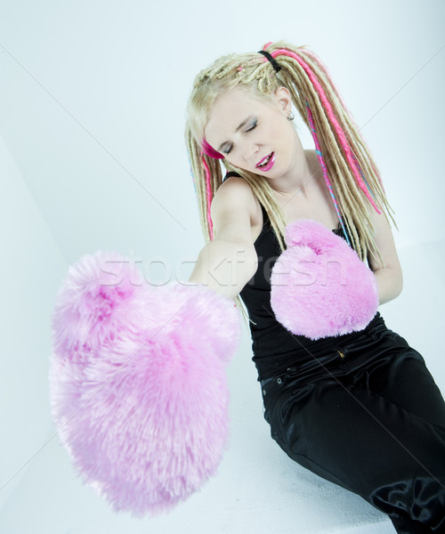 portrait of young woman with dreadlocks and boxing gloves Stock photo © phbcz