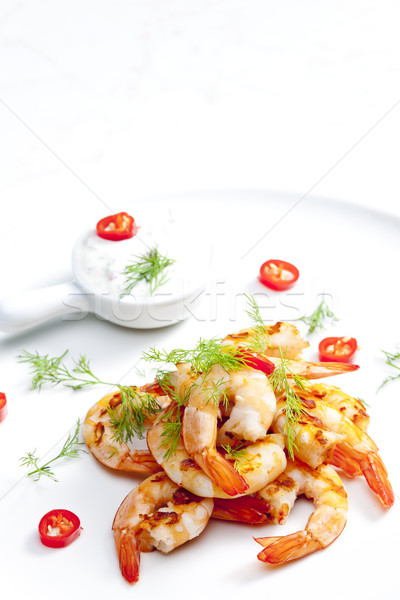 grilled prawns with dip of garlic, chilli and dill Stock photo © phbcz