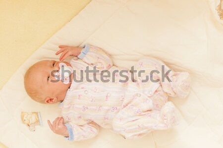lying newborn baby girl Stock photo © phbcz