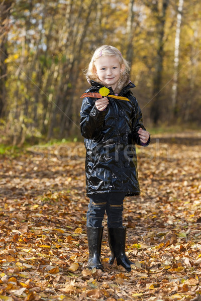 Stock photo: little girl wearing rubber boots in autumnal nature