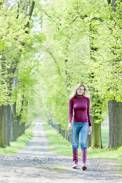 Frau tragen Gummistiefel Fuß Frühling Gasse Stock foto © phbcz