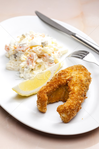 Stock photo: fried carp with potato salad