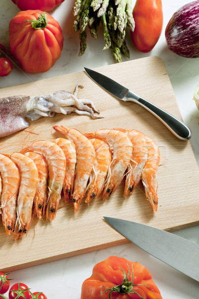 Stock photo: still life of raw seafood and vegetables