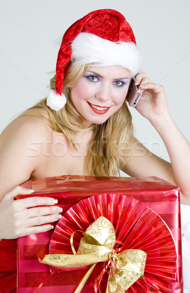 calling Santa Claus with Christmas present Stock photo © phbcz
