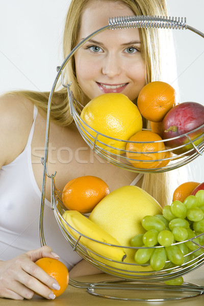 woman during breakfast with fruit Stock photo © phbcz