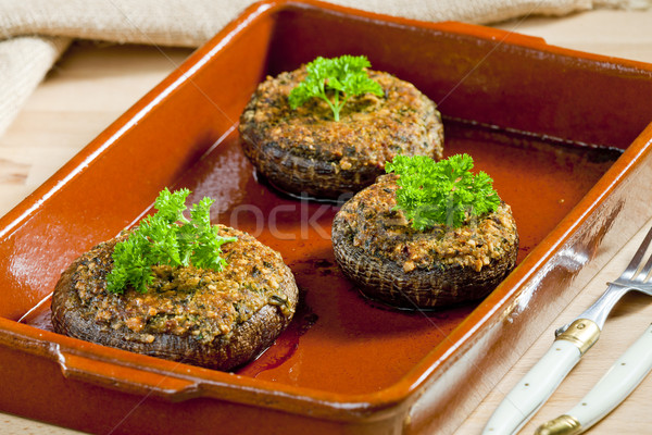 baked champignons filled with peanuts mixture Stock photo © phbcz