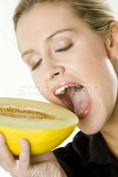 Retrato mujer melón frutas jóvenes comer Foto stock © phbcz