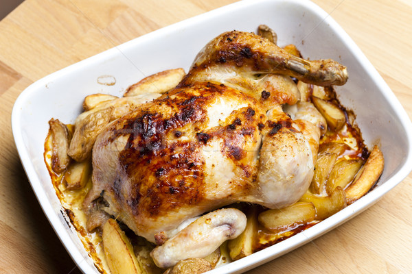 Stock photo: chicken baked with potatoes