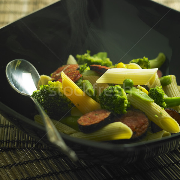 penne pasta with green vegetables and sausages Stock photo © phbcz